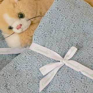 hand knitted baby blanket by carmelia linen