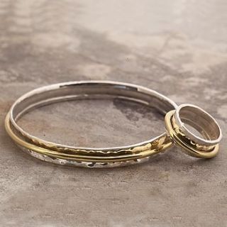 silver and gold spinning bangle set by otis jaxon silver and gold jewellery