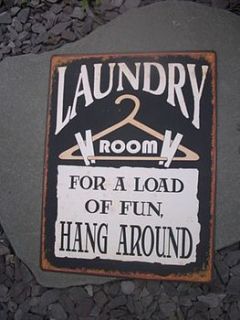 retro 'laundry' hanging sign by the hiding place