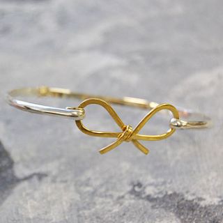 bow sterling silver and gold bangle by otis jaxon silver and gold jewellery