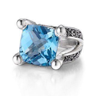 Sterling Silver This eye catching Sara Blaine sterling silver ring features a 14mm faceted blue topaz Sara Blaine Jewelry