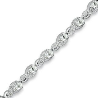 Pear Shaped White Topaz and 1/10 CT. T.W. Diamond Bracelet in Sterling