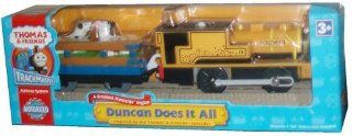 Trackmaster Railway System   Thomas and Friends Motorized Road and Rail Battery Powered Tank Engine  Duncan Does It All with Duncan Engine and Farm Wagon with 2 Cows Plus Two Straight Tracks Toys & Games