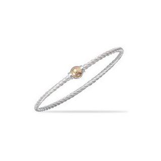 7.5" sterling silver twisted cable bangle bracelet with 14 karat gold bead. One side of the bead is threaded to allow the bracelet to be opened and charms added. The bead is 7.5mm and is not removable. Necklace Jewelry