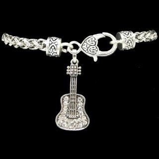From the Heart Clear Crystal Rhinestone Embellished Guitar Bracelet fits 7 1/2 inch Wrist  Crystal Rhinestone Sparkling Guitar is approximately 1 1/2 inch long   Fantastic Valentines or Any Day Gift for any Woman who plays the Guitar or Loves Music Jewel