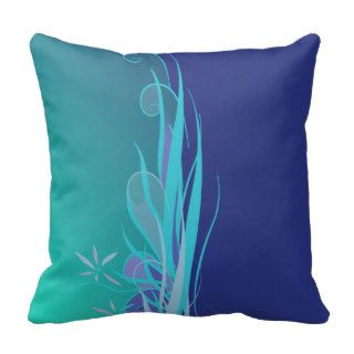 teal and marine blue floral throw pillows