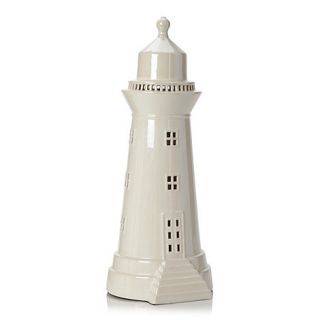 At home with Ashley Thomas Ceramic white lighthouse lamp