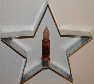 10 Inch Candle Star Wall Mount or Sit on a Table to Display. Amish Created and Handmade By the Old Order Amish Community. Adjustable Candle Holder Is Made to Hold a Battery Operated Candle Timer Taper. Not for Use with an Open Flame. Candle Shown Is 4.5 In